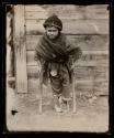 Belgrade. Crippled boy begging.