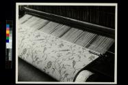 Weaving upholstery material, Shelton Looms, Shelton, Conn.