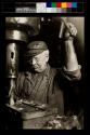 Old-time mechanic in railroad shop