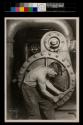 Mechanic at steam pump in Electric power house.