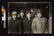 Midnight at the Bowery Mission bread-line, on the Bowery - in the old days of depression & winter.