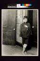 [Boy waiting for the dispensary to open, Hull House district , Chicago]