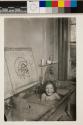 [Combined bath and laundry in a tenement sink]