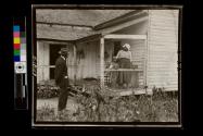 [Agent from the state Agricultural Department visits a farm home, Georgia]