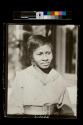 [Woman wearing sailor dress and wide belt]