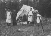 Camp Workers Next to Tent, George Eastman's Nipigon Trip