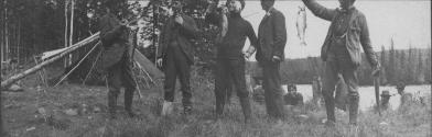 Party displaying their fish, George Eastman's Nipigon Trip