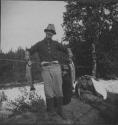 Camping Companion Displaying Fish, George Eastman's Nipigon Trip