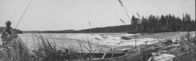Canoe Beside River, George Eastman's Nipigon Trip