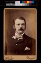 [Man with moustache and bowtie]
