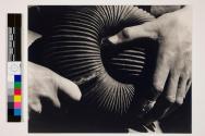 [Robert Howard's hands and wood carving]