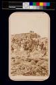 [Group of people in front of Tip-Top House, Mount Washington]