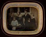 [Woman with four children, outdoors]