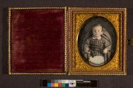 [Boy (possibly postmortem) holding statue of dog]