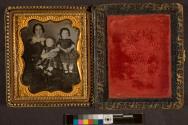 [Portrait of a woman with two children]