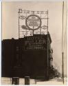 [Daytime view of "Diamond Tires" sign on top of Hotel Fuller]