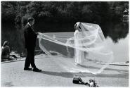 [Photographer and bride]
