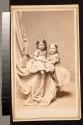[Two young girls embracing]