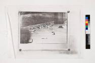 [Photograph with tacks in the corners]