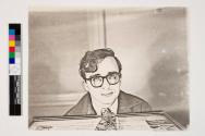 [Thomas F. Barrow wearing glasses and paisley tie]