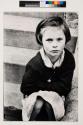 [Girl sitting on cement stairs, Southampton Street]