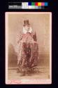 [Man dressed in a floral pattern costume]