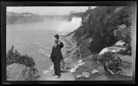 [Charles Zoller on edge of gorge at Niagara Falls]