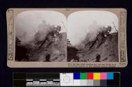 Over the top, amid bursting gas and tear shells, in a determined assault on the fortified Somme villages.