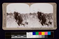 Artillery observation officer in forward post regulates our barrage during the advance on Woncourt [sic]