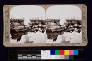 Under great difficulties our troops carry supplies over destroyed bridges on the Yser Canal.