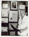 Harris Tuttle with his awards