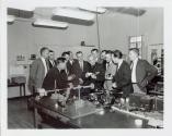 Harris Tuttle showing camera to large group