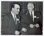 Harris Tuttle smoking cigar with superimposed Al Capone