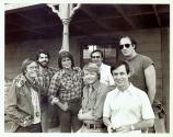 Michael Landon posing with crewmembers on set during shoot of Kodak commercial