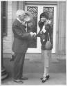 George Eastman shaking hands with Mary Garden
