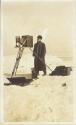 Man with a rare Cirkut camera no. 16 on a tripod