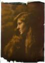[Woman with long, red hair]