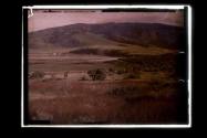 [Landscape with river and mountains]
