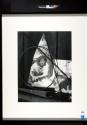 Gerry Sharpe reflecting in glass


