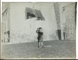 [James Sibley Watson Jr. on front lawn of 11 Prince Street, Rochester, NY]