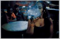 Transvestite Smoking in the Olympia Cafe
