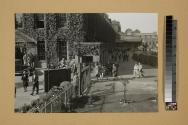 Employees entering gate at Kodak factory