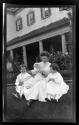 Nell & Watson Newhall in Eastman's garden with the Dryden children