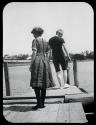 George Eastman and Mary Mulligan on dock in bathing suits, Labrador Trip
