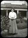 Woman standing in garden