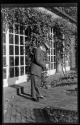 George Eastman using Cine Kodak in Terrace Garden outside Colonnade