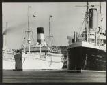 [Stockholm, Sweden. Three tourist liners on Strömmen]