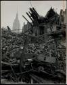 [New York, demolition. Empire State Building in distance]