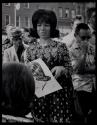 [Sidewalk artist and woman with portrait, Greenwich Village]