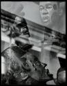 [Anthropological display - tribal masks, museum exhibit]